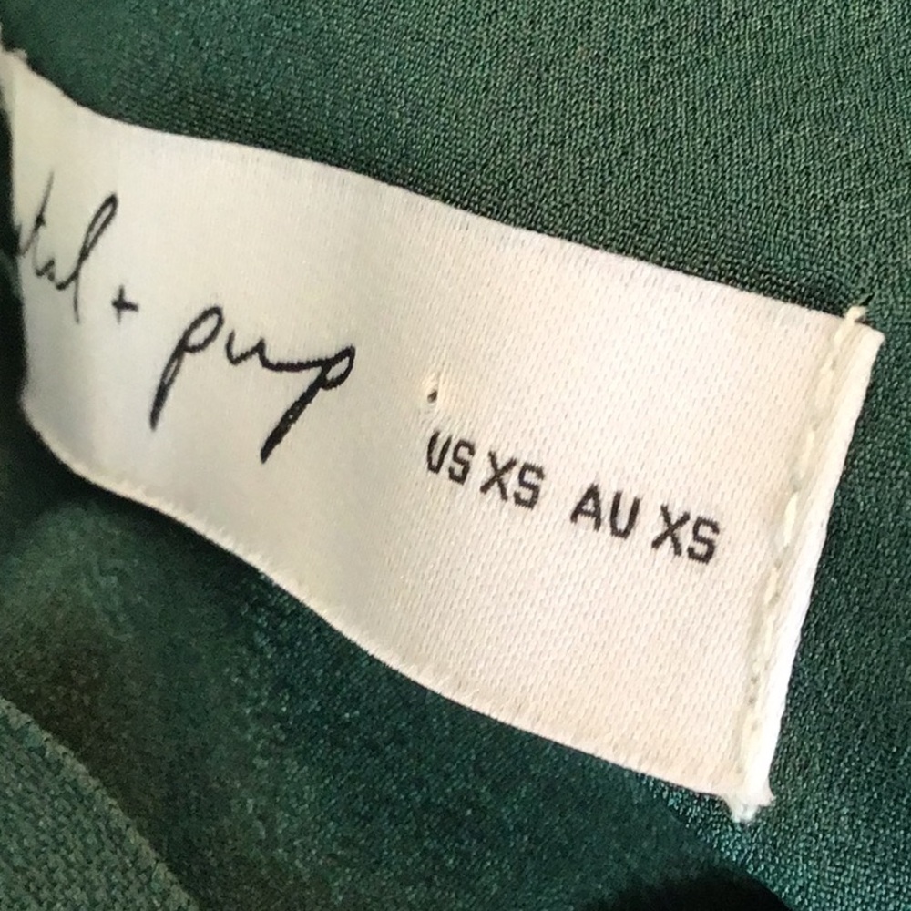 Birdie Ruffle Detail Asymmetric Satin Dress
Petal & Pup - Picture 15 of 16